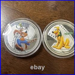 2015 Disney Colorized Goofy And Pluto. 999 Silver Round